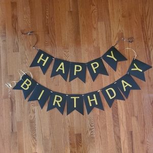 Happy birthday sign. Black and gold. Banner. Extra ribbon provided